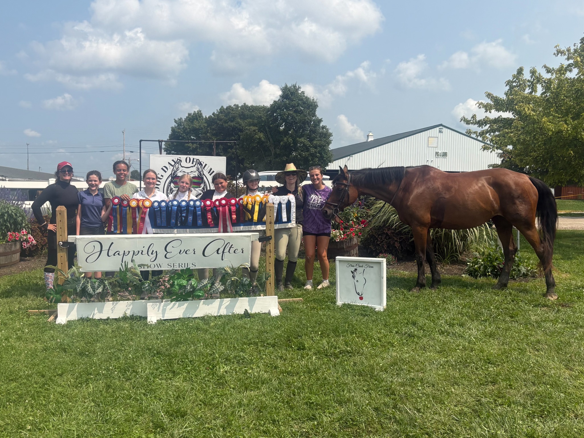 Carlson Hunters & Jumpers riders celebrating with ribbons at the Happily Ever After Show Series